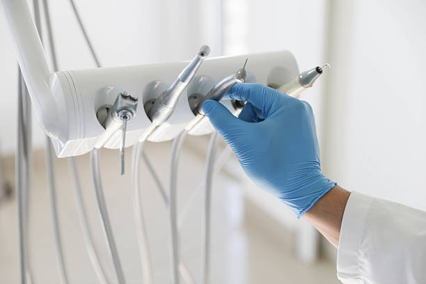 Professional Tooth Extraction technician working in Lake Bryan, TX